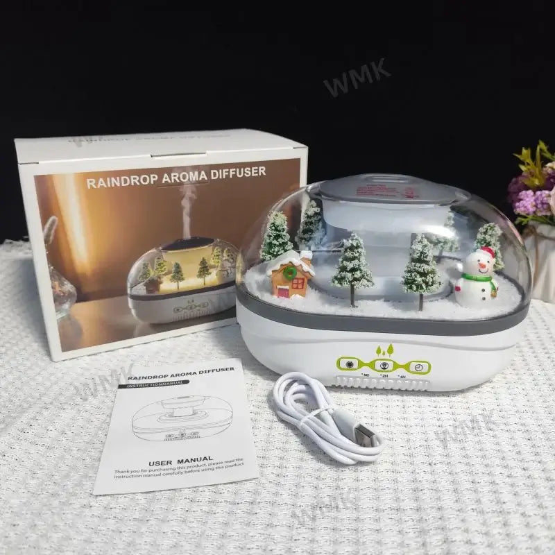 Raindrop cloud aroma diffuser with festive decoration, user manual, and packaging for home use in UAE.